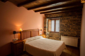 Гостиница Apartamentos El Sualleiro  Санта-Эулалиа-Де-Оскос